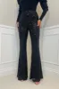 PERI High Waisted Sequin Flair Trousers in Black sold by Talliah Rose UK