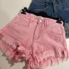 OPAL High Waisted Frayed Edge Acid Wash Denim Shorts in Candy Pink sold by Talliah Rose UK