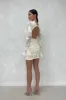 MADDISON Vanilla Embroidered Backless Mesh Mini Dress sold by Talliah Rose UK