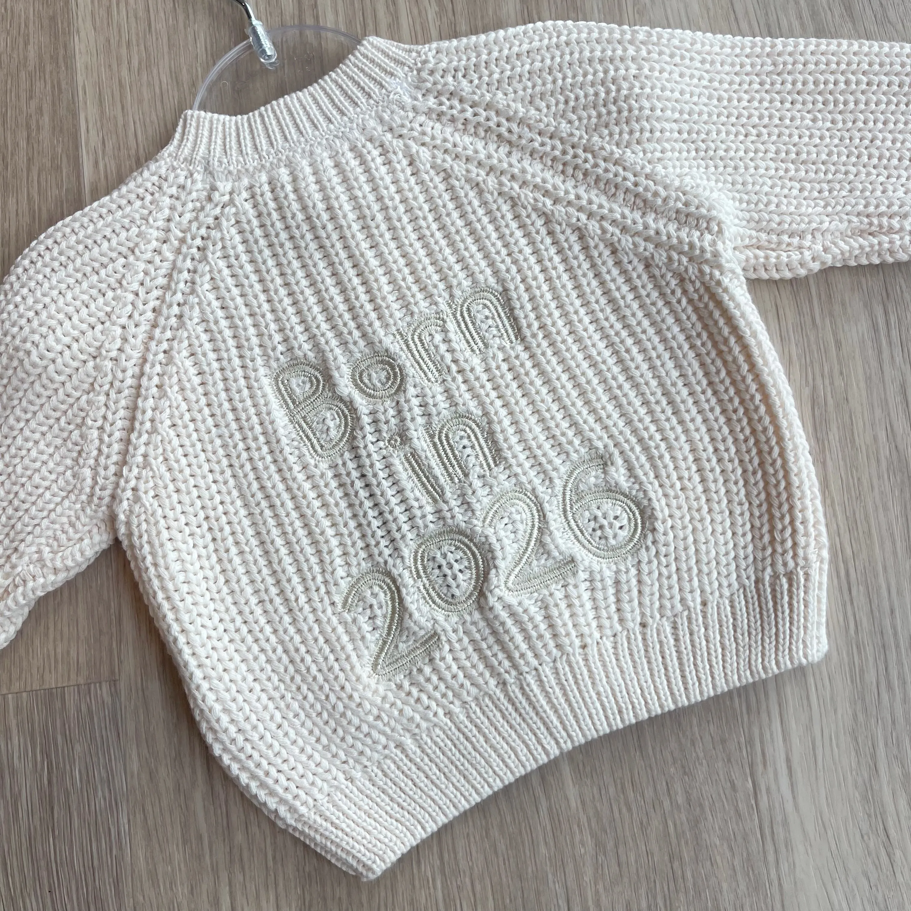 Born in 2026 Chunky Knit Cardigan in Cream sold by Talliah Rose UK product image thumbnail 2