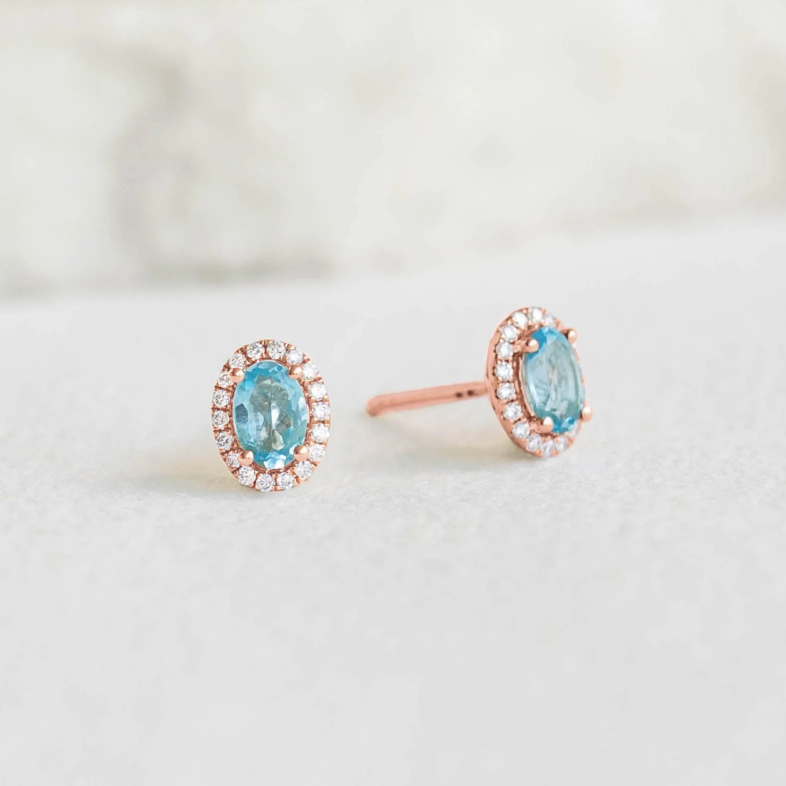 Swiss Blue Topaz Halo Stud Earrings Rose Gold - Marzia sold by Linjer