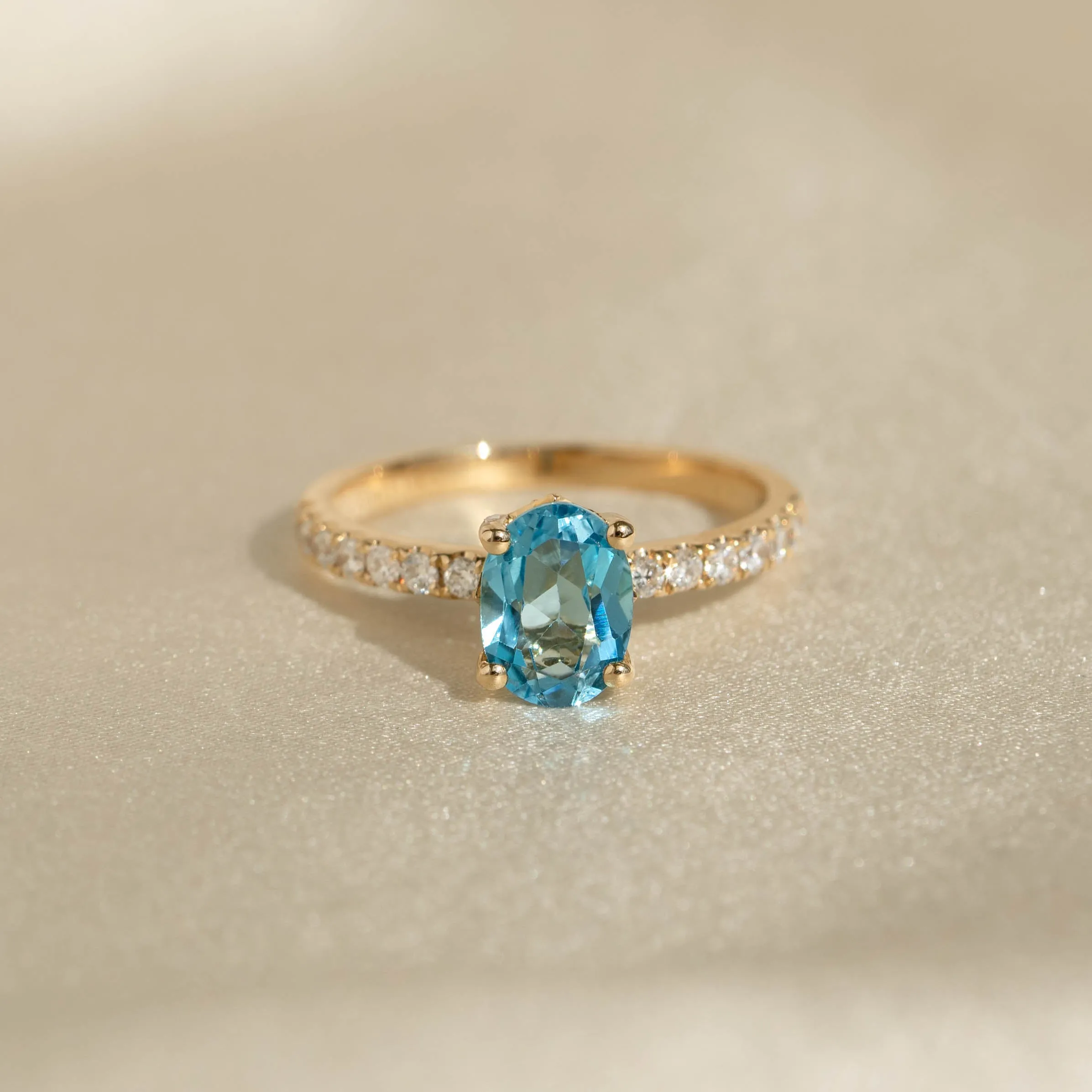 Oval Swiss Blue Topaz and Diamond Ring 14k Gold - Minette sold by Linjer