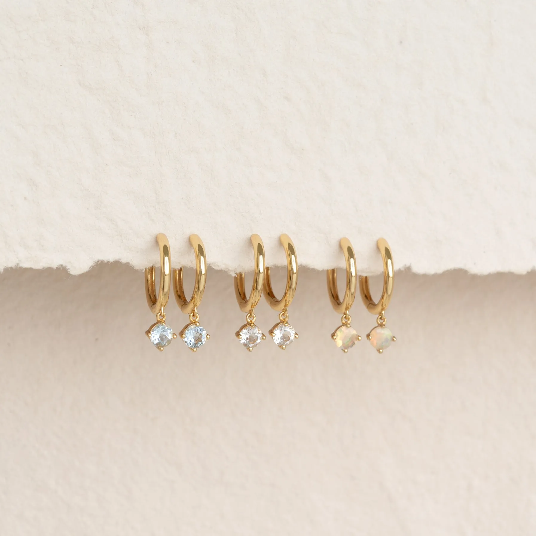 October Birthstone Drop Huggie Earrings - Opal sold by Linjer product image thumbnail 5