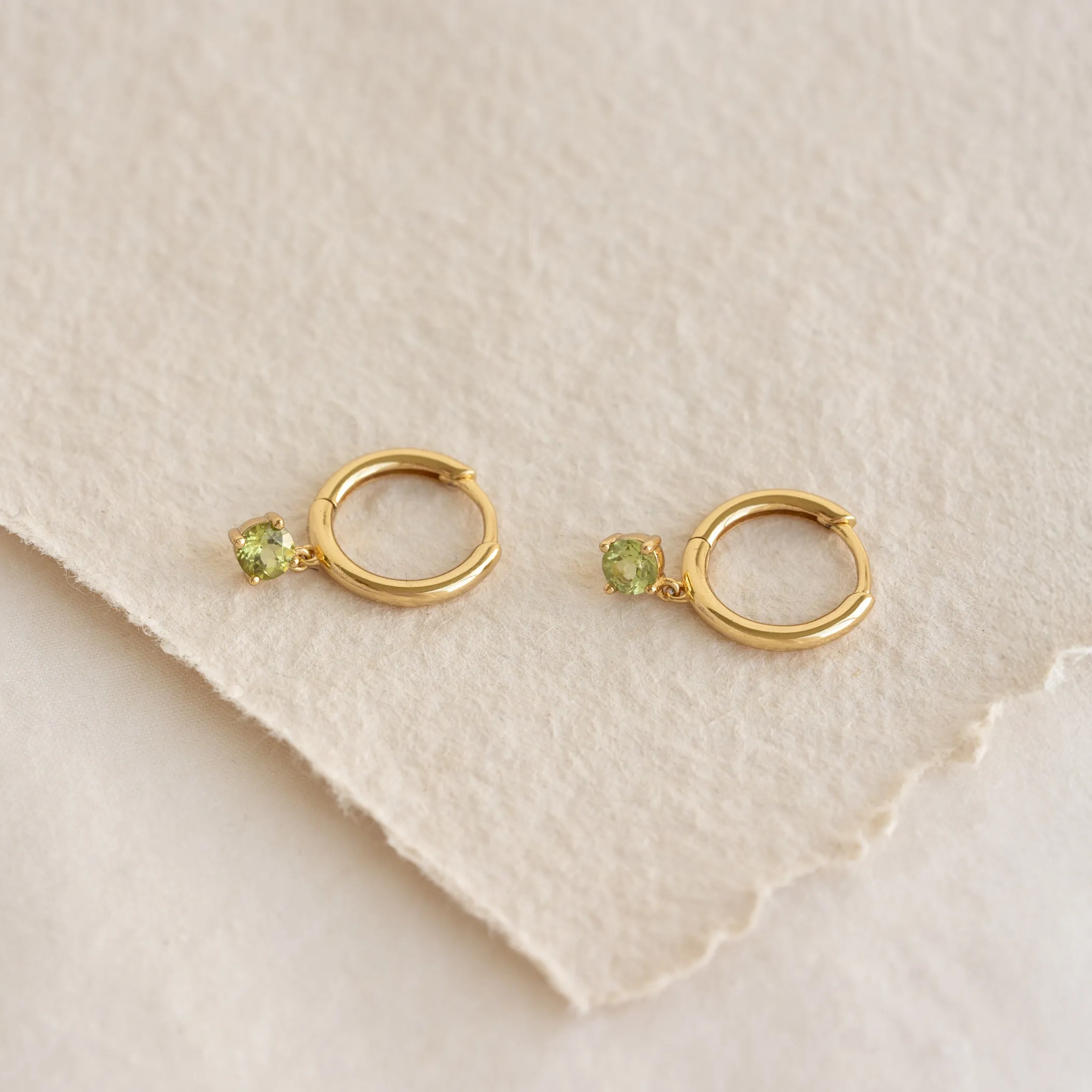 August Birthstone Drop Huggie Earrings - Olivine sold by Linjer product image thumbnail 2