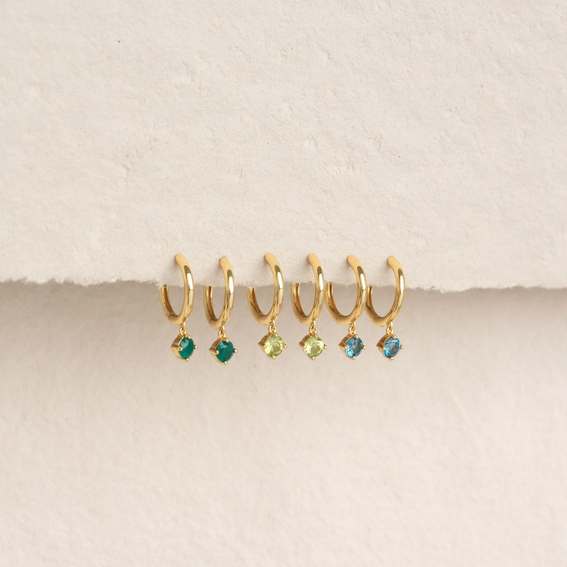 August Birthstone Drop Huggie Earrings - Olivine sold by Linjer product image thumbnail 4