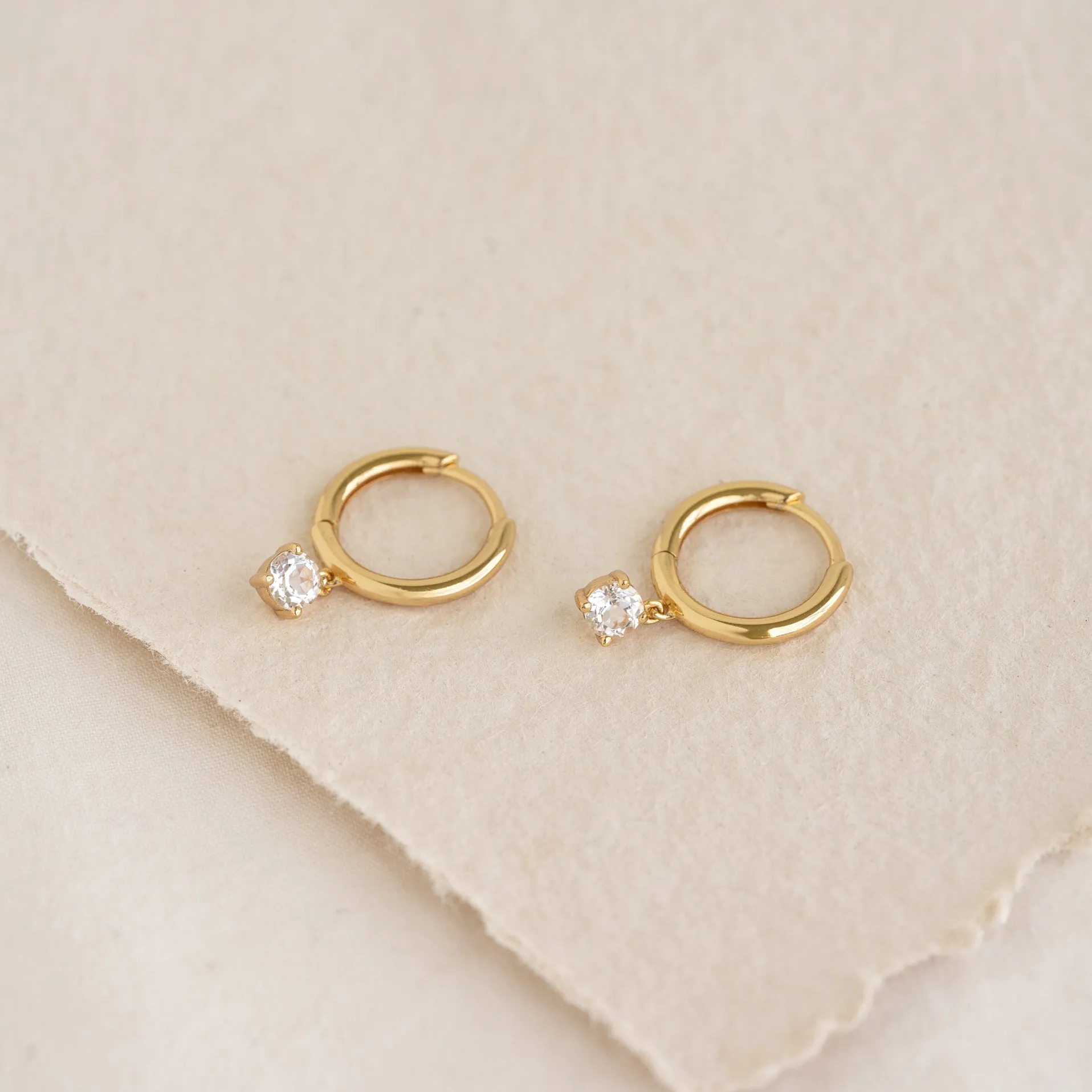 April Birthstone Drop Huggie Earrings - White Topaz sold by Linjer product image thumbnail 2