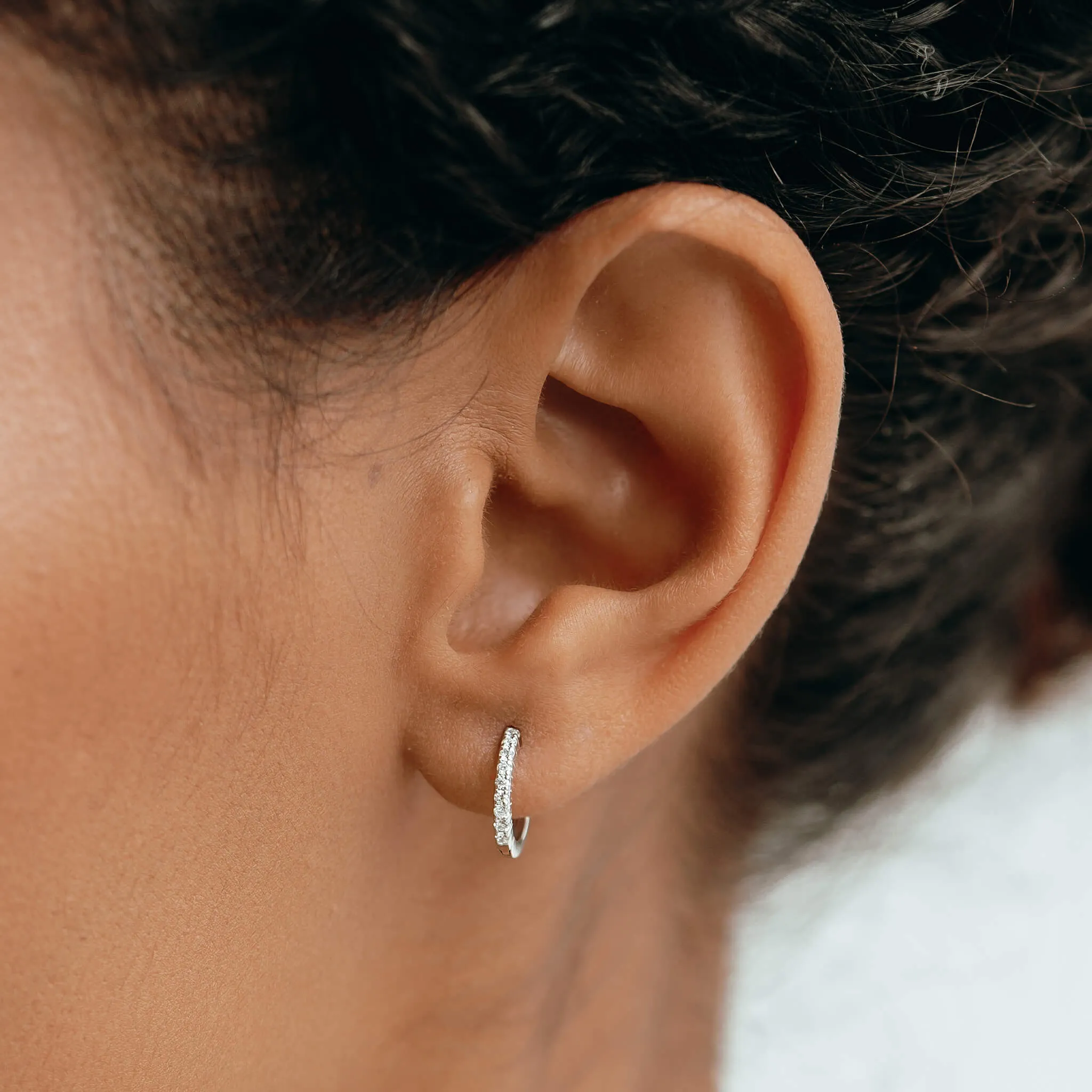 14k White Gold Diamond Huggie Earrings - Susanna sold by Linjer product image thumbnail 2