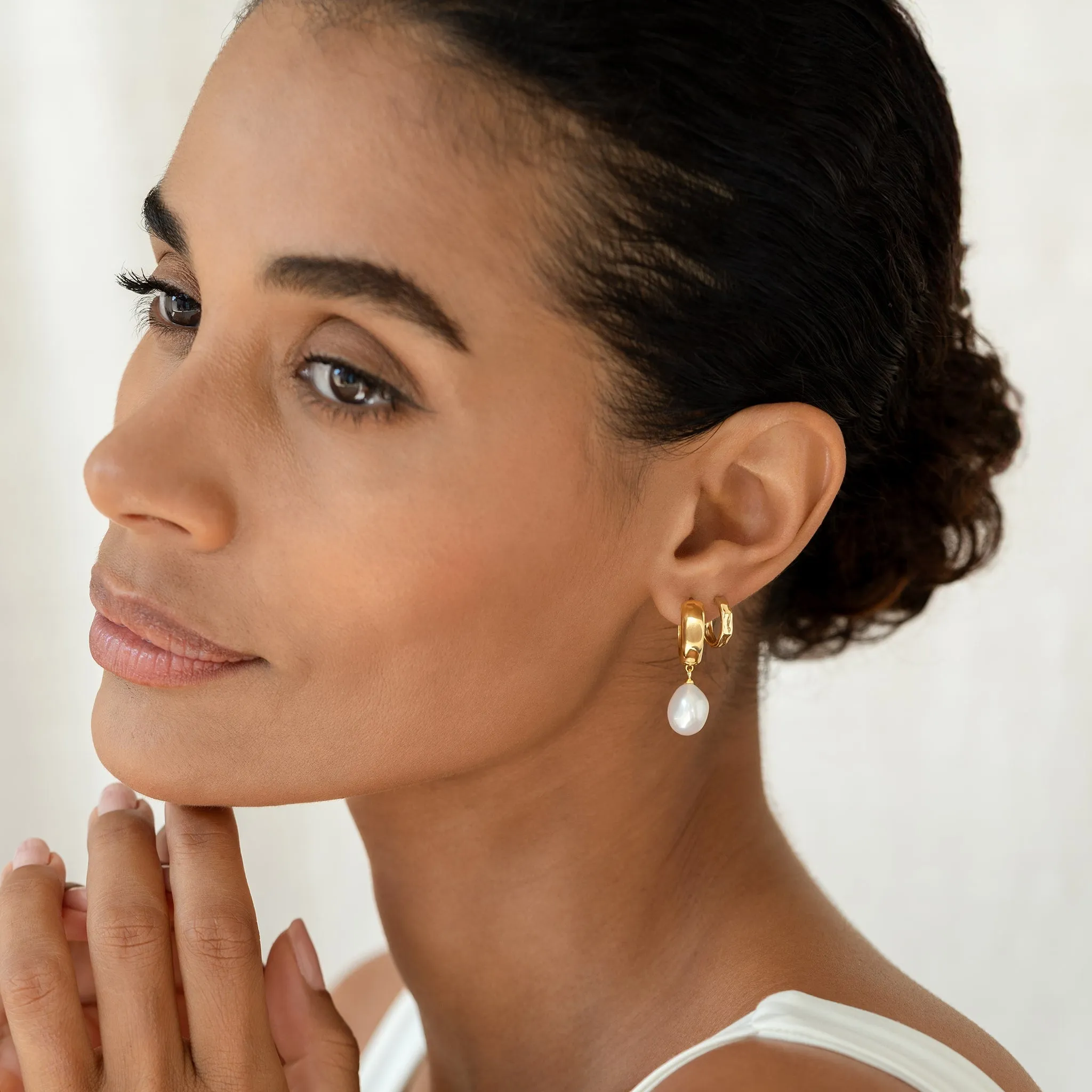 Gold Hammered Huggie Hoop Earrings - Yulla sold by Linjer product image thumbnail 4