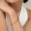 Gold Organic Bangle M/L - Aelia sold by Linjer