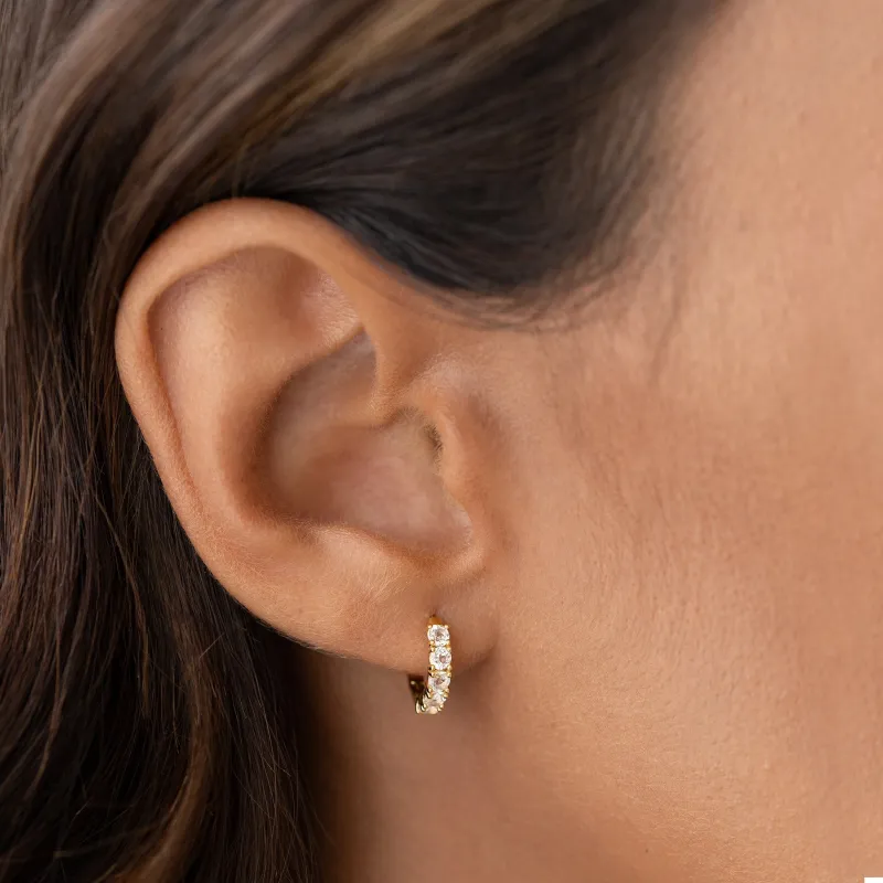 April Birthstone Huggie Earrings - White Topaz made by Linjer