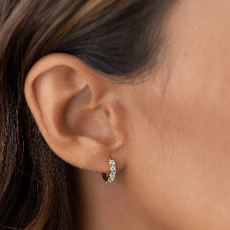 March Birthstone Huggie Earrings - Blue Topaz sold by Linjer