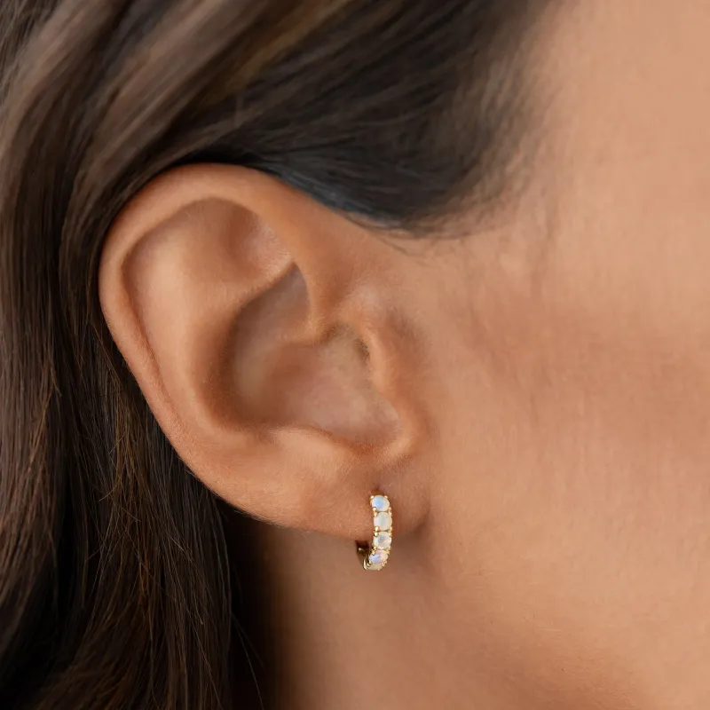 October Birthstone Huggie Earrings - Opal sold by Linjer