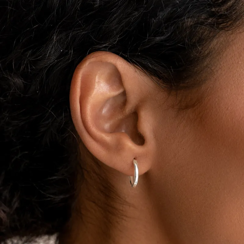 White Gold Huggie Earrings - Emilia sold by Linjer
