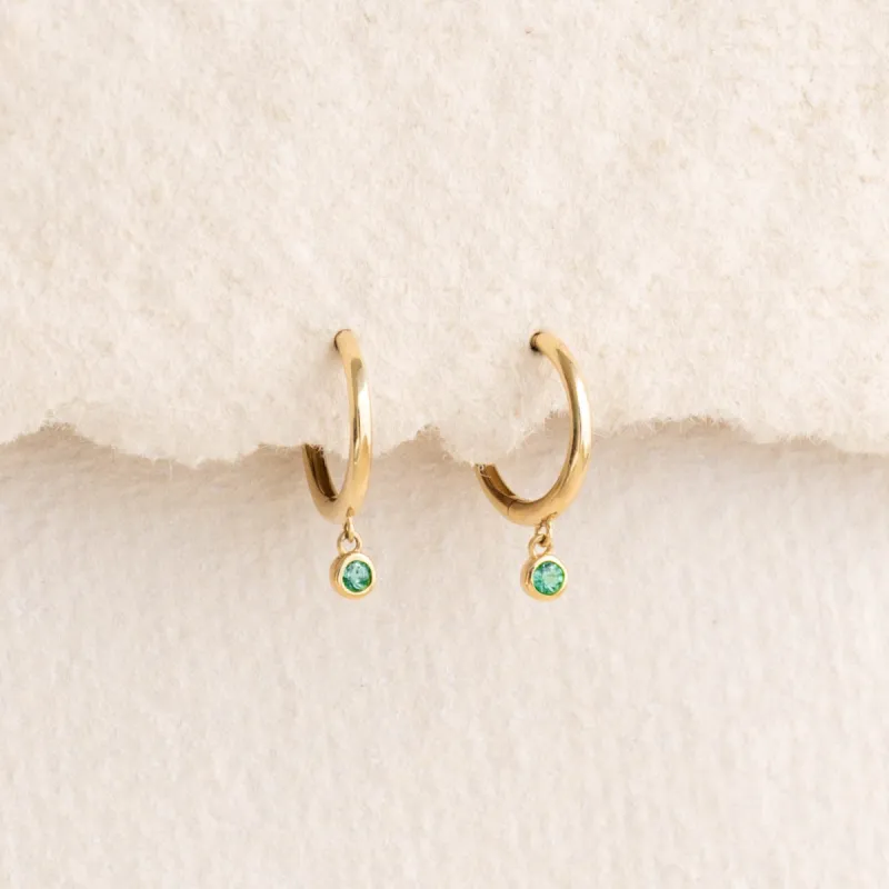 Emerald Huggie Earrings 14k Gold - Bianca sold by Linjer