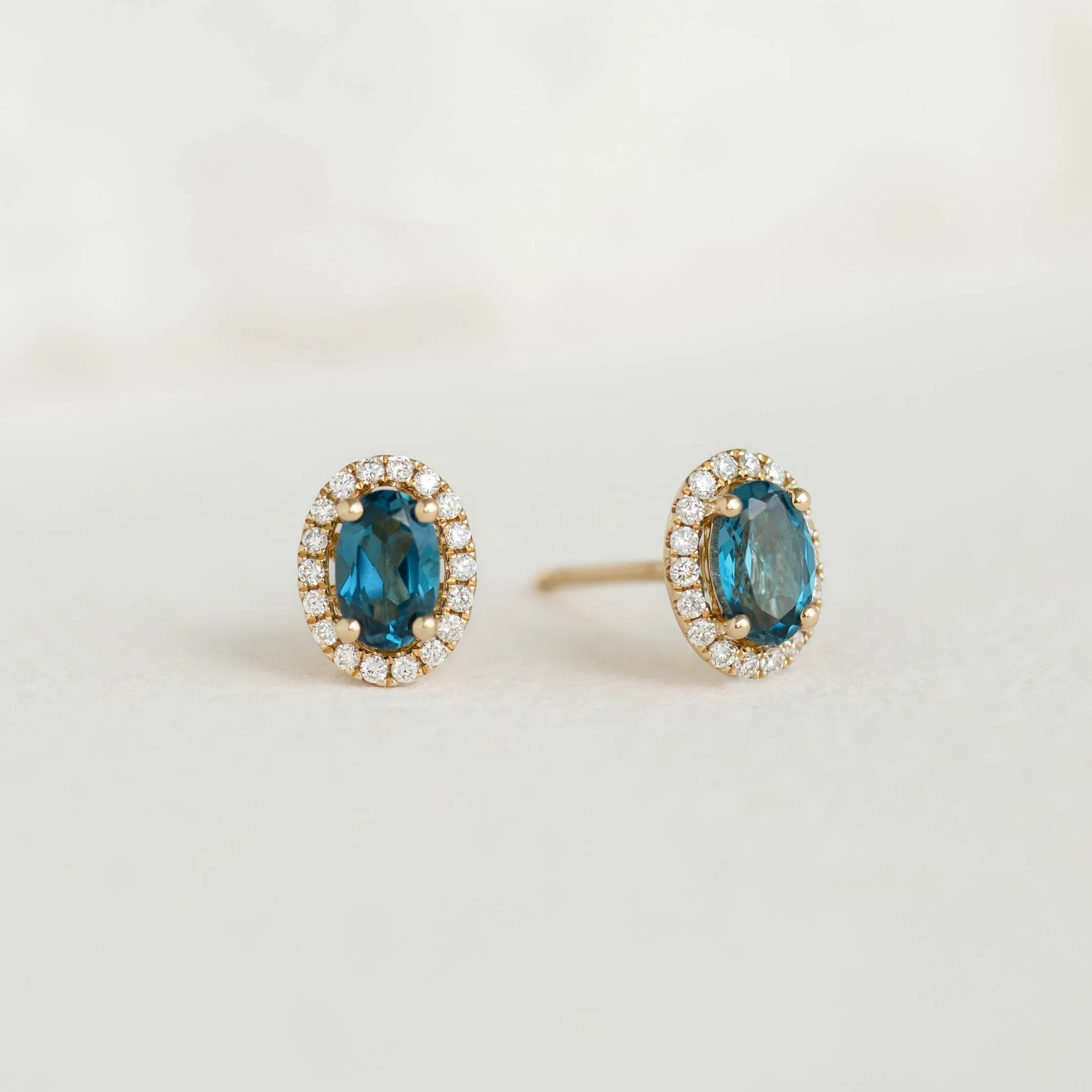 London Blue Topaz Halo Stud Earrings 14k Gold - Marzia sold by Linjer