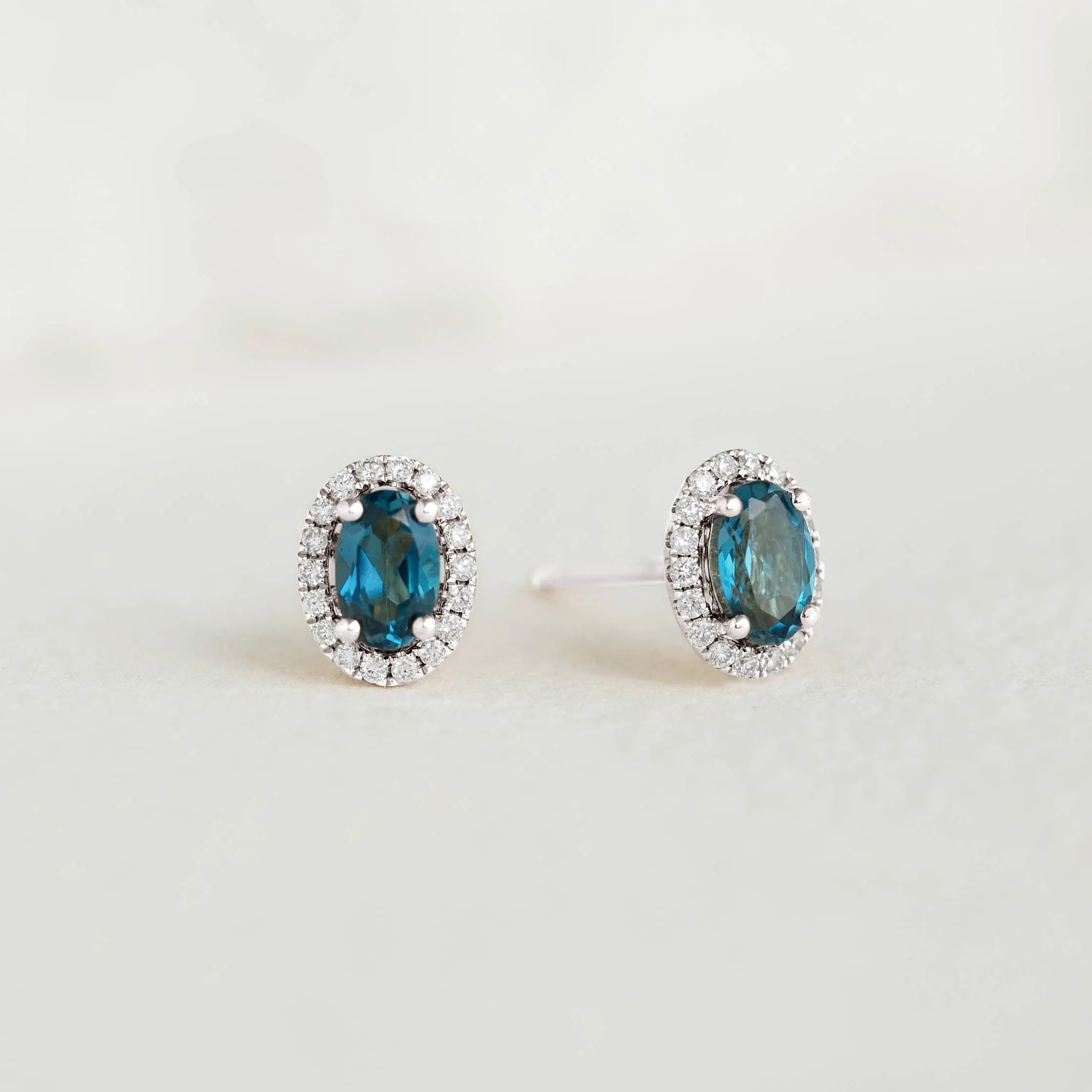 London Blue Topaz Halo Stud Earrings White Gold - Marzia sold by Linjer