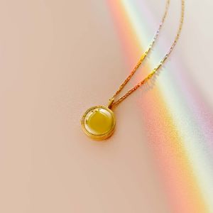 Esme Locket Necklace sold by Sugar Blossom