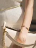 Double Curb Bracelet sold by VERAFIED