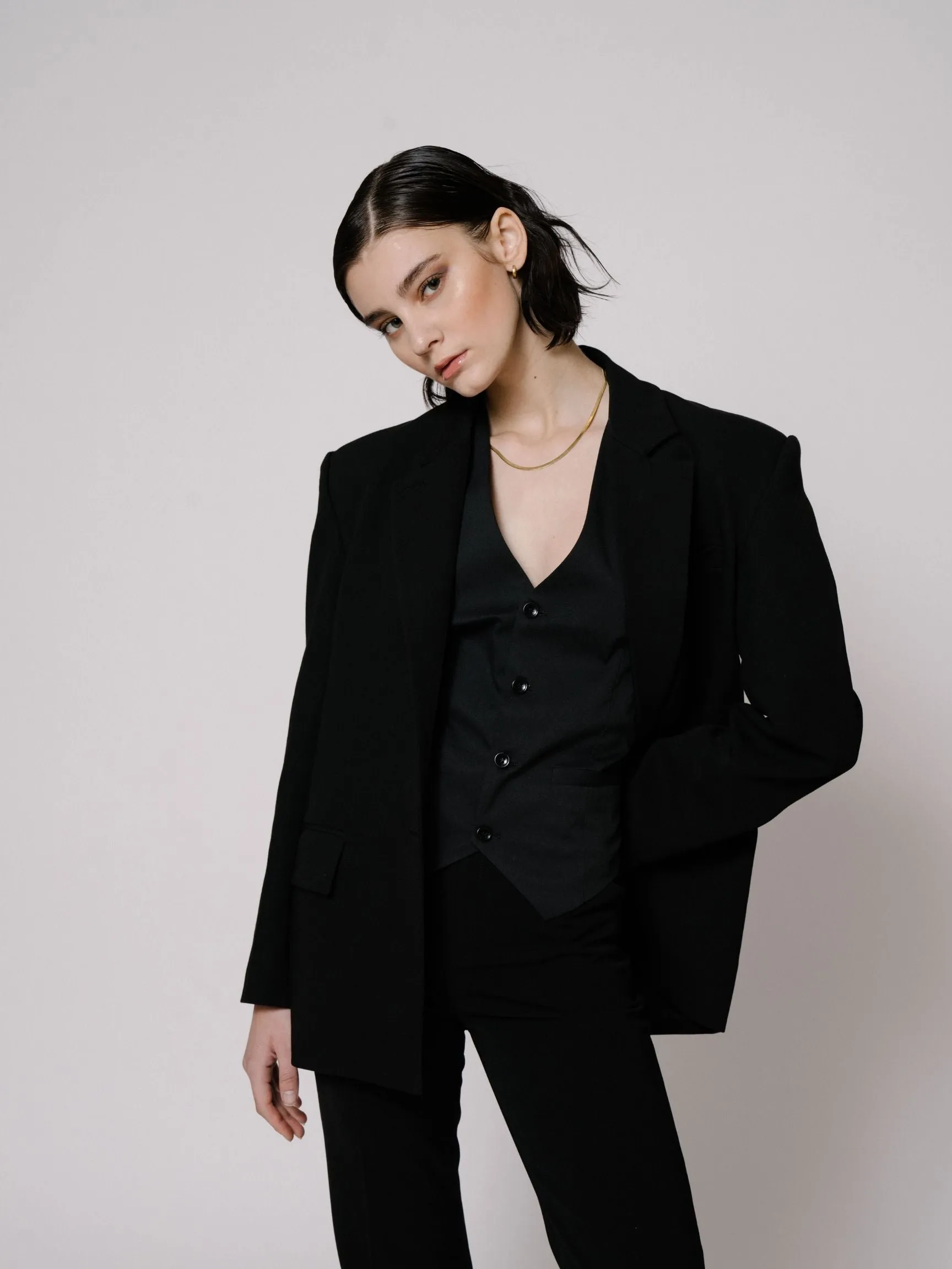 Black Wide-Shoulder Blazer sold by VERAFIED
