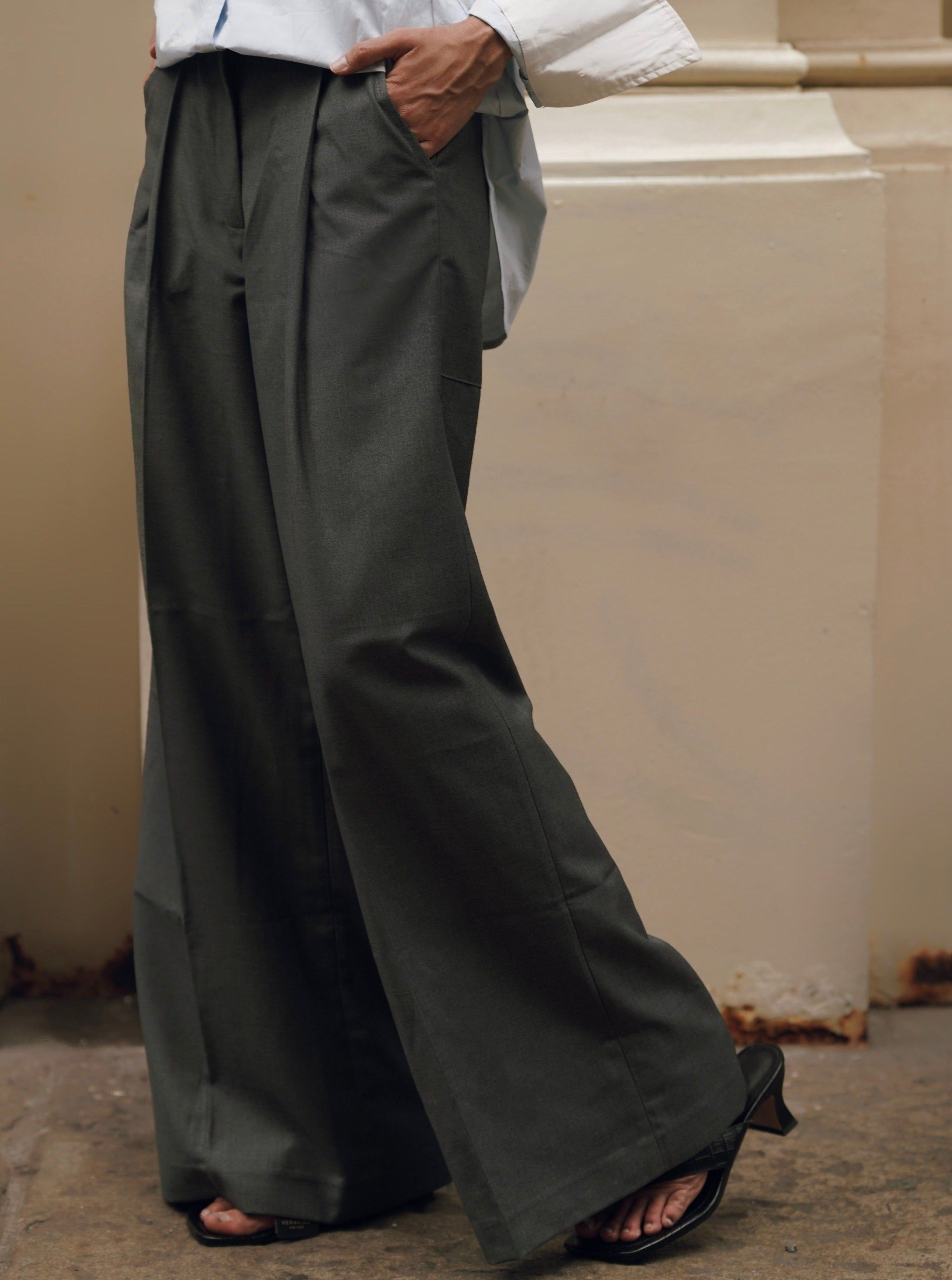 Frank Pleated Wide-Leg Trousers (Final Sale) sold by VERAFIED