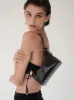Mini Gold Black Hobo Bag sold by VERAFIED