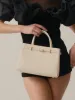 Ivory Togo Book Tote Bag 25 sold by VERAFIED