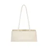 Gold Ivory Éclair Bag sold by VERAFIED