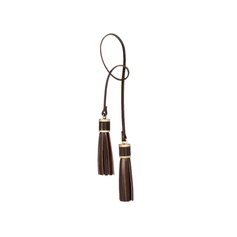 Chocolate Tassel Charm sold by VERAFIED