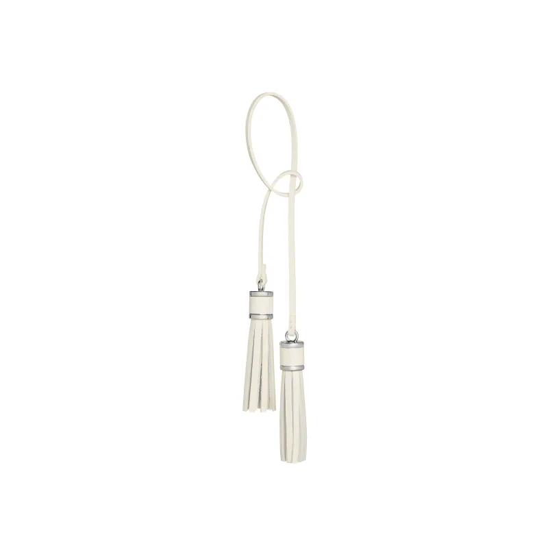 Silver Ivory Tassel Charm sold by VERAFIED