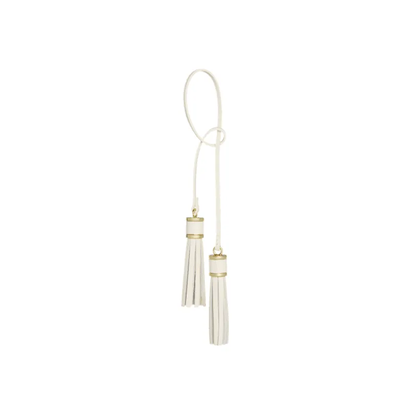 Gold Ivory Tassel Charm sold by VERAFIED