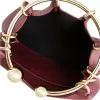 Burgundy Ring Handle Bag sold by VERAFIED