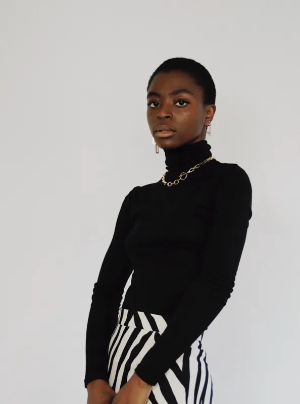 Black Modal Turtleneck sold by VERAFIED