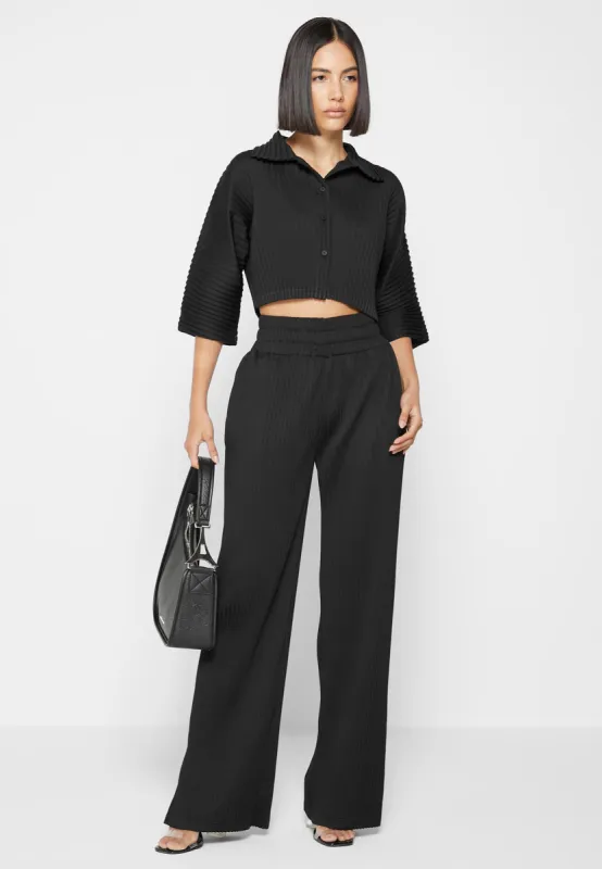 Pleated Trousers - Black sold by Maniere De Voir
