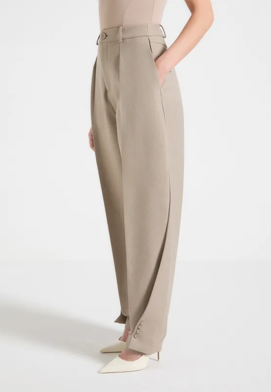 Sophie - Twist Leg Tailored Trousers - Taupe sold by Maniere De Voir