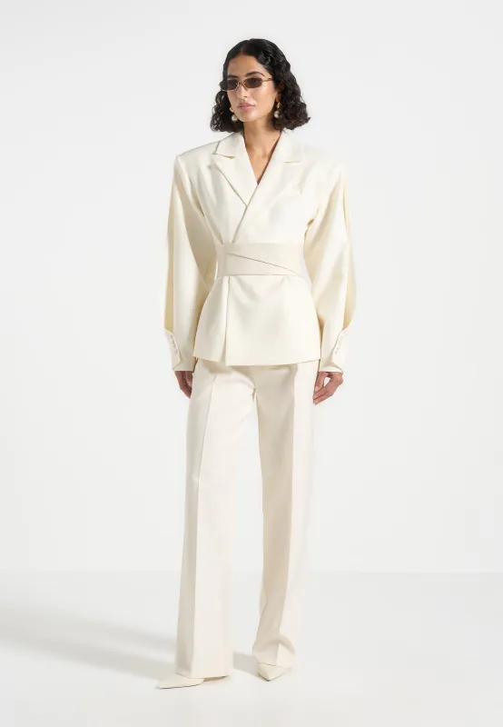 Marie - Twist Sleeve Tailored Blazer with Belt - Cream sold by Maniere De Voir