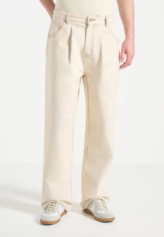 Arnault - Pleated Denim Jeans - Cream sold by Maniere De Voir