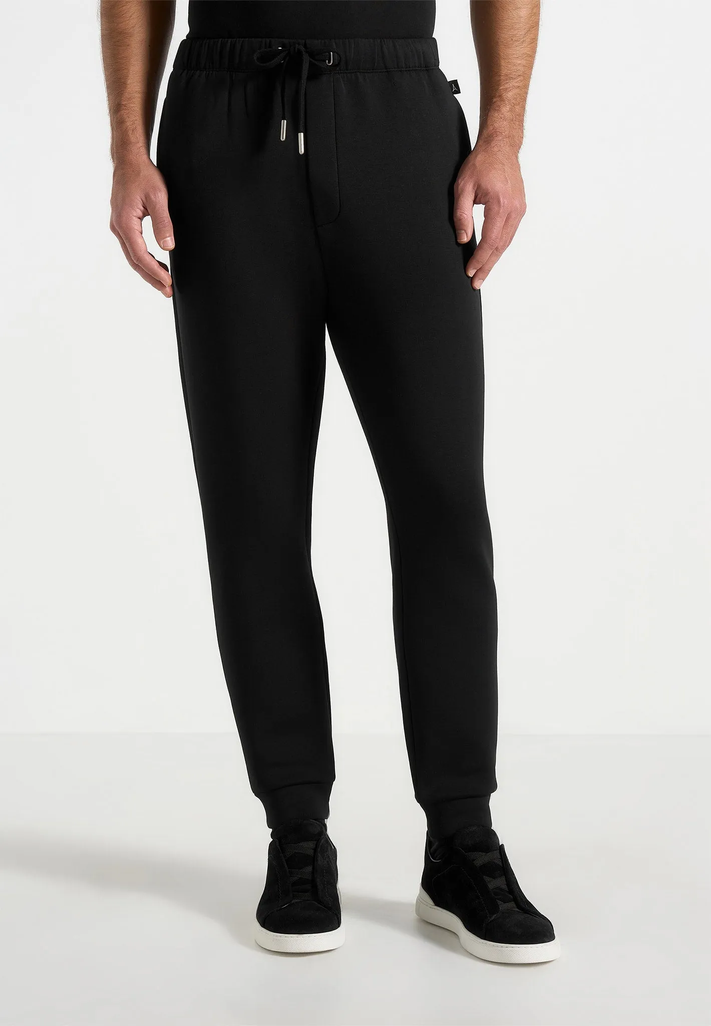Dion - Neoprene Minimal Tapered Fit Cuffed Joggers - Black sold by Maniere De Voir