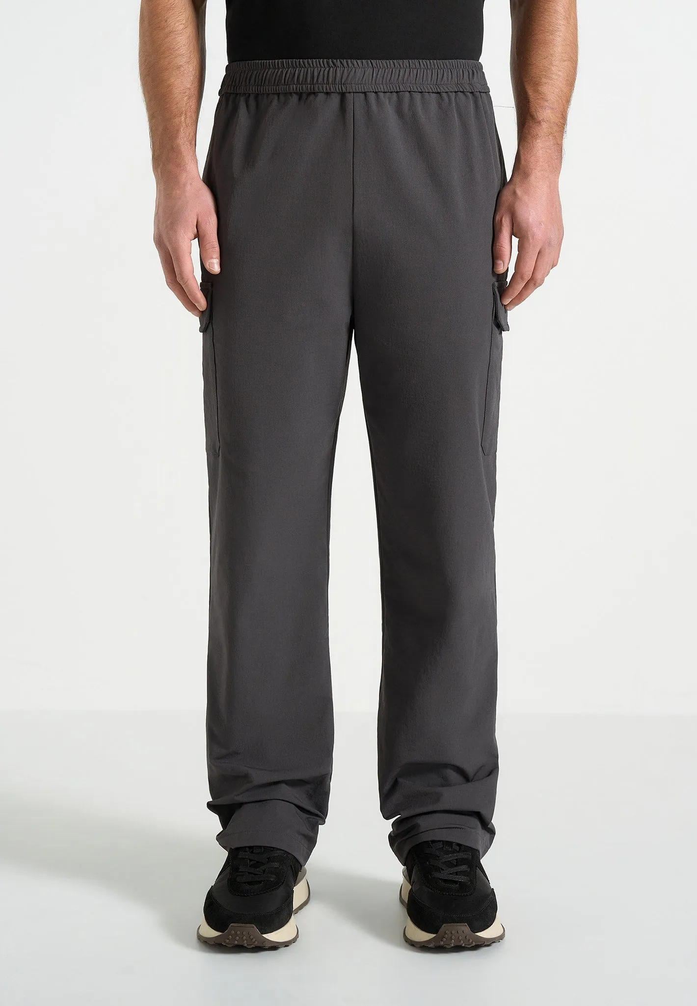 Rayan - Technical Cargo Trousers - Charcoal sold by Maniere De Voir