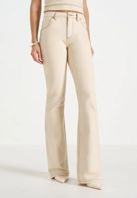 Abbie - Stacked Fit And Flare Jeans - Cream sold by Maniere De Voir