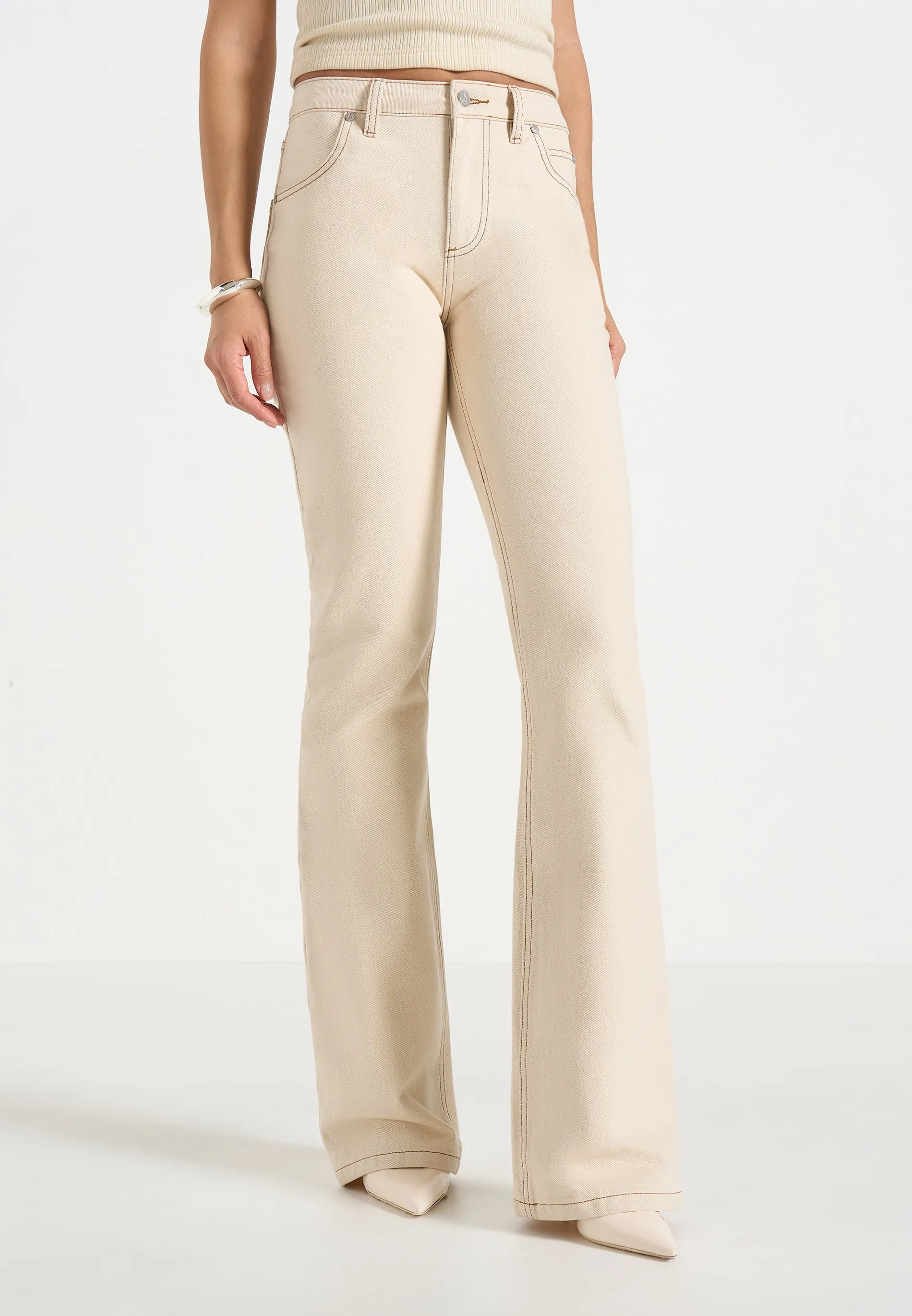 Abbie - Stacked Fit And Flare Jeans - Cream sold by Maniere De Voir