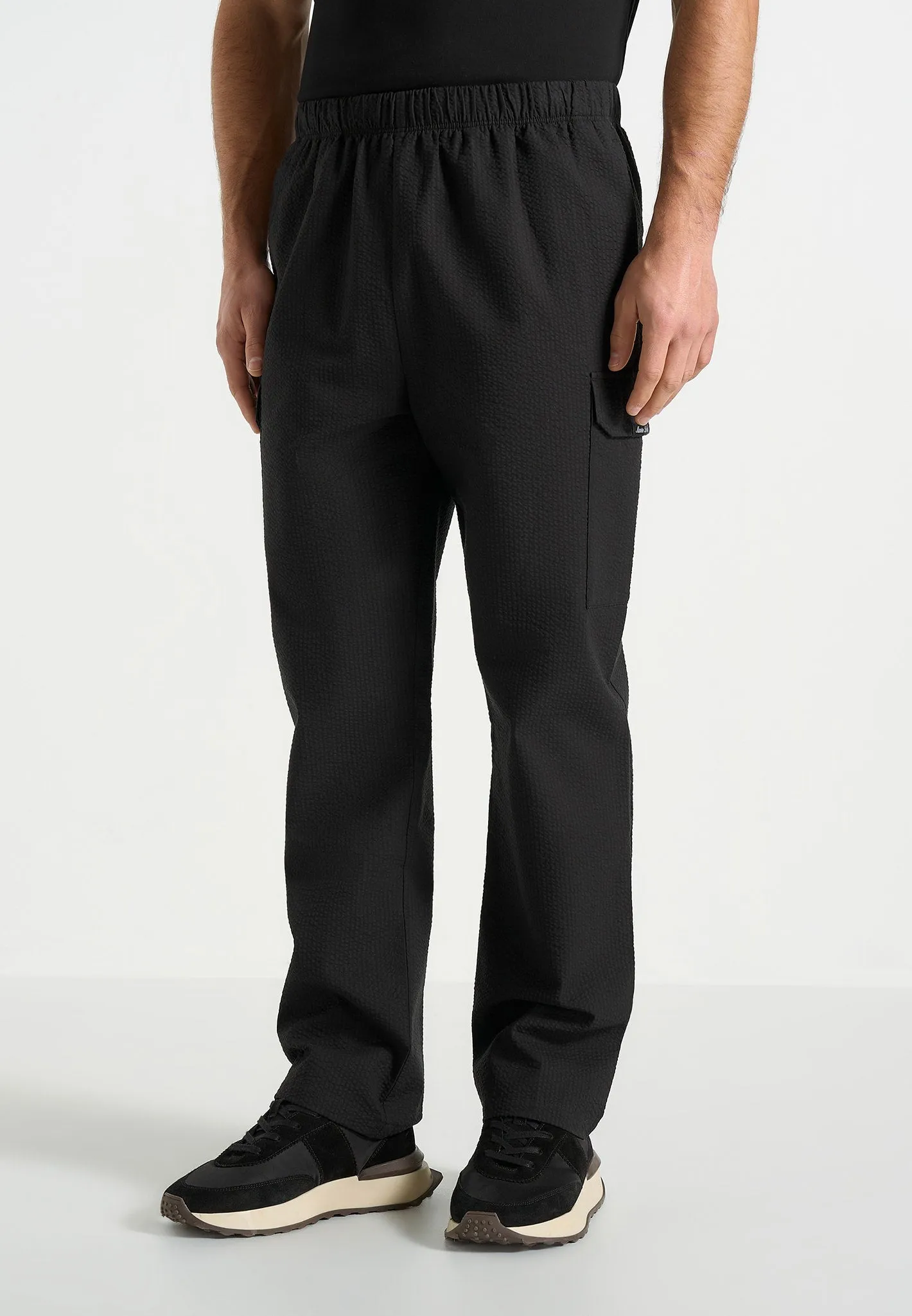 Rayan - Textured Cargo Trousers - Black sold by Maniere De Voir