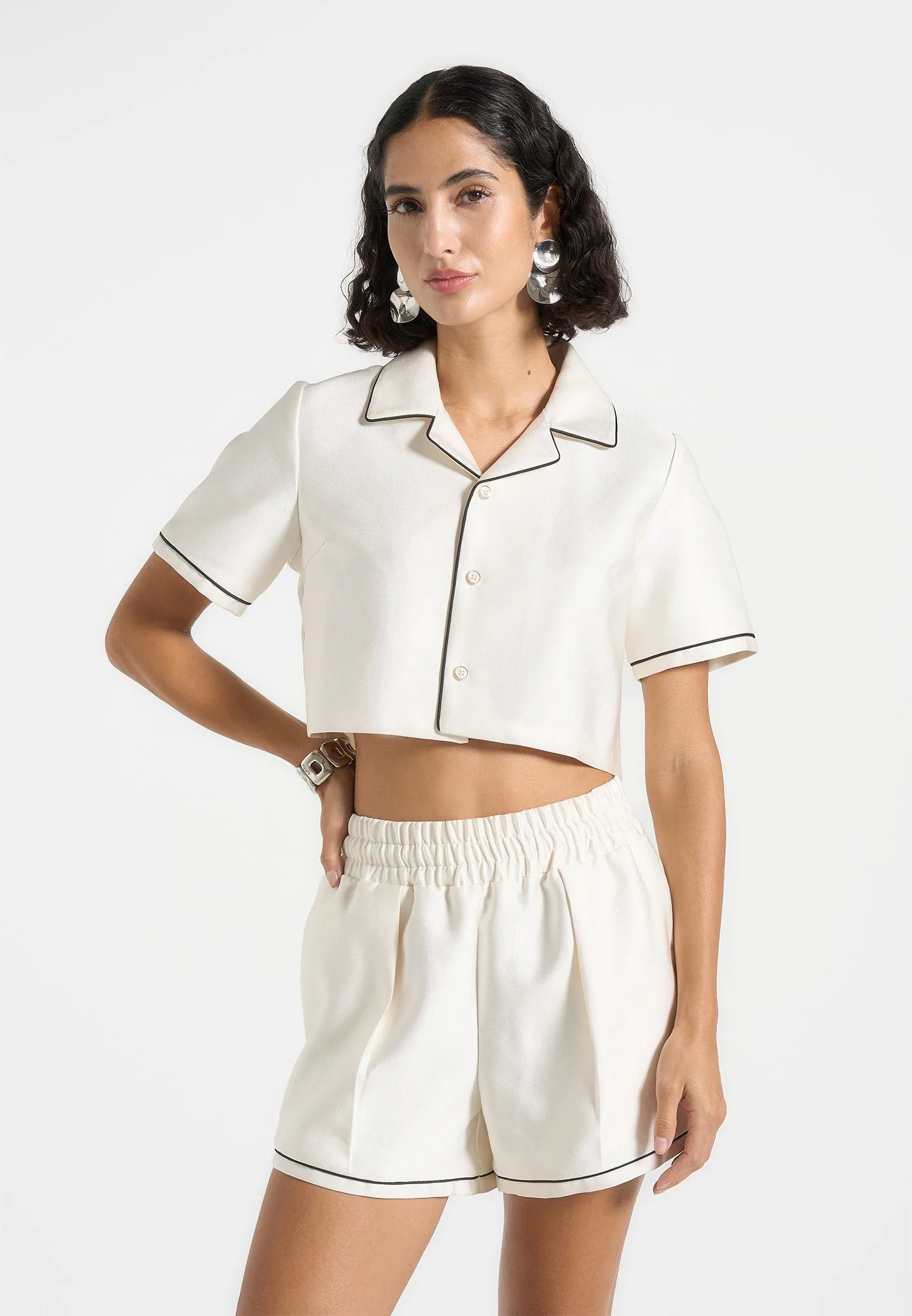 Maude - Satin Cropped Shirt with Piping - Off White sold by Maniere De Voir