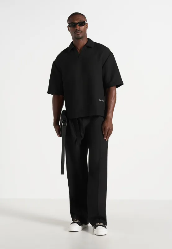 Joss - Boxy Signature Polo Shirt - Black made by Maniere De Voir