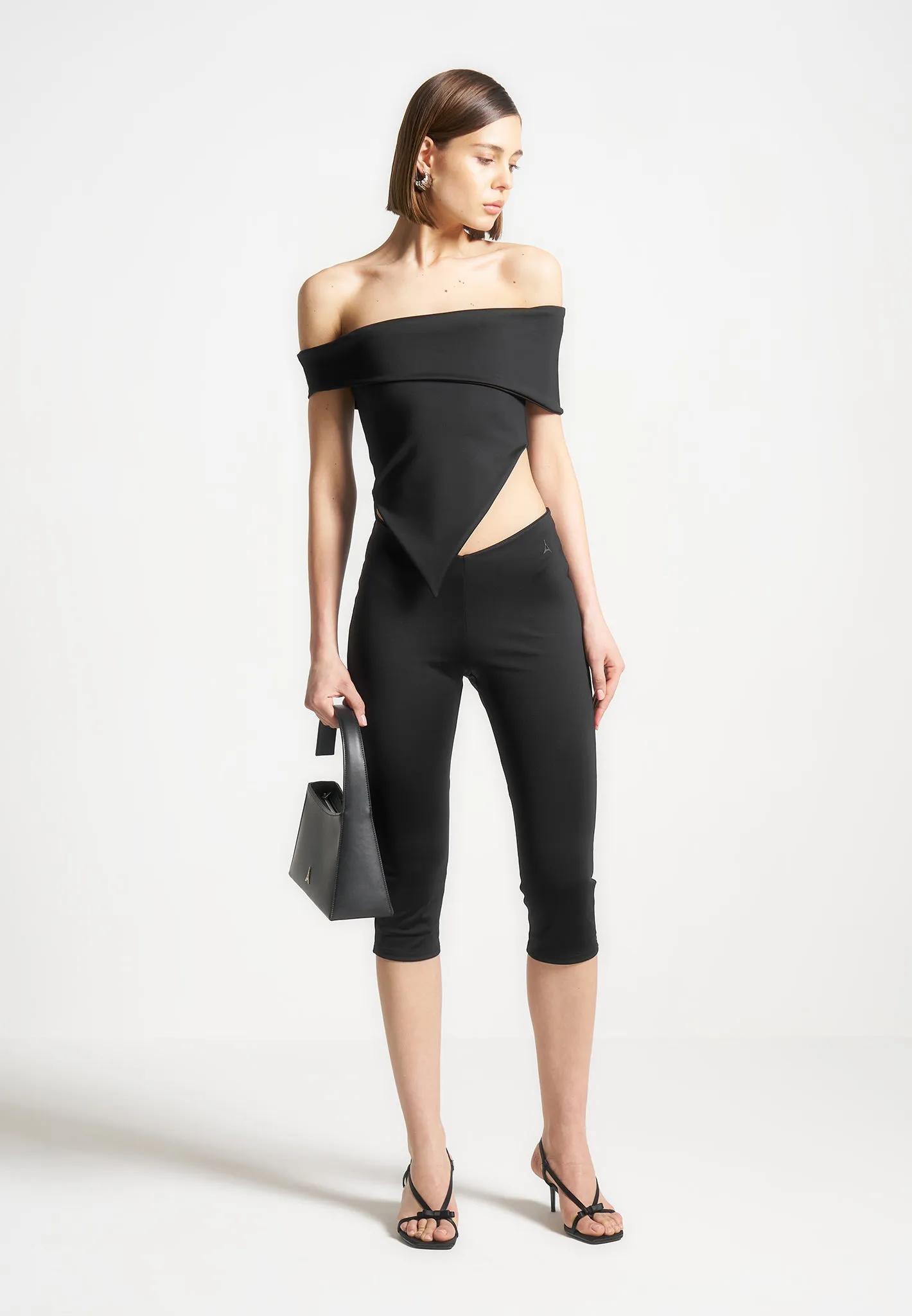 Angled Waist Capri Leggings - Black sold by Maniere De Voir