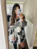 Notebook -V Neck Floral Print Tunic Shift Dress sold by Amoretu