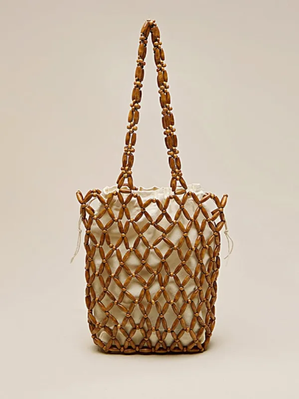 Retro Wood Bead Woven Hollow Out Handbag sold by Amoretu