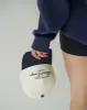 sapphire aloura trucker hat sold by Aloura Lounge