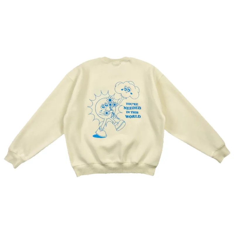 *almost perfect* buttercream blue "you're needed in this world" ultra cozy crewneck sold by Aloura Lounge