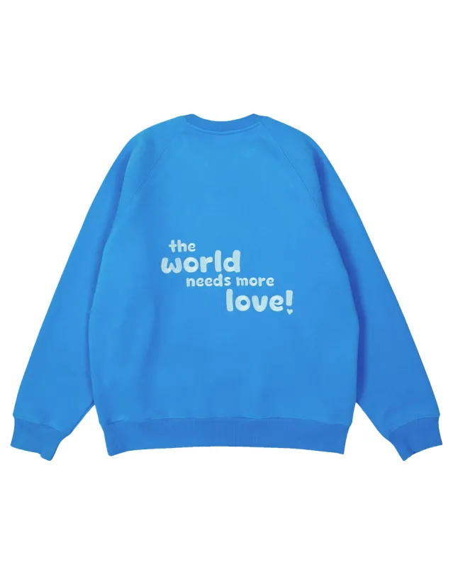 breezy blue "the world needs more love" ultra cozy crewneck sold by Aloura Lounge