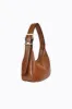 Gigi - Tan sold by PETA AND JAIN